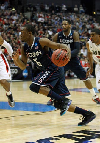 Kemba Walker of the UConn Huskies drives