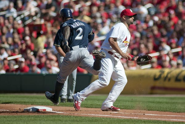 Brewers center fielder Nyjer Morgan and Cardinals first baseman Albert Pujols