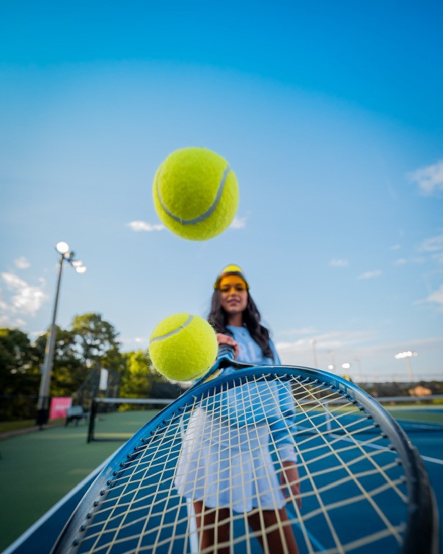A lady playing tennis - 6 Skills You Require When Playing Tennis